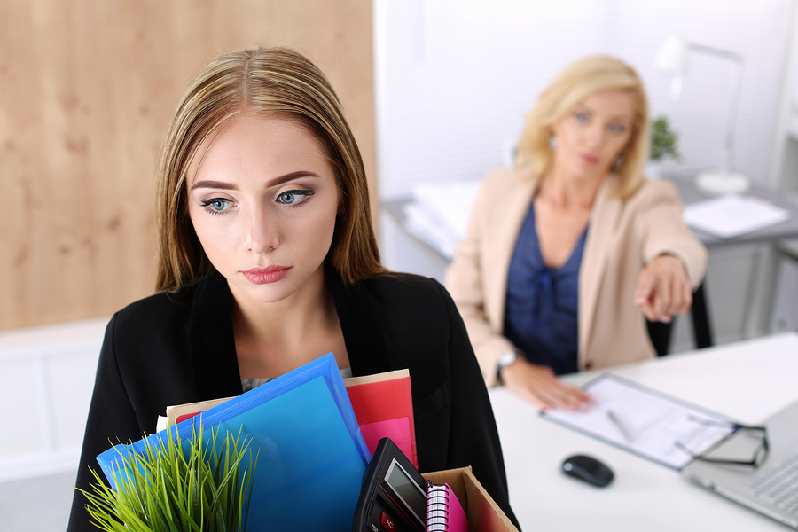 woman at work dealing with wrongful termination