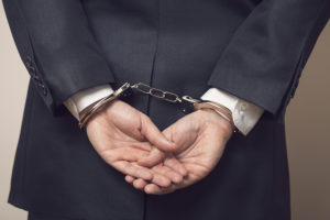 business man in handcuffs