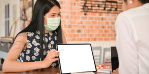 woman in mask at work