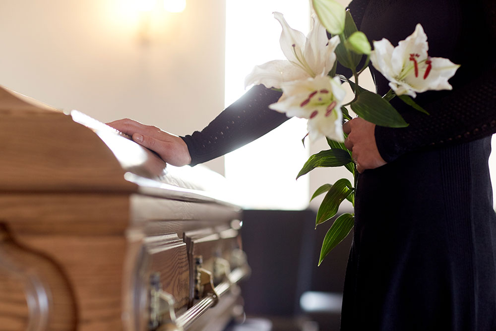 woman at funeral, wrongful death